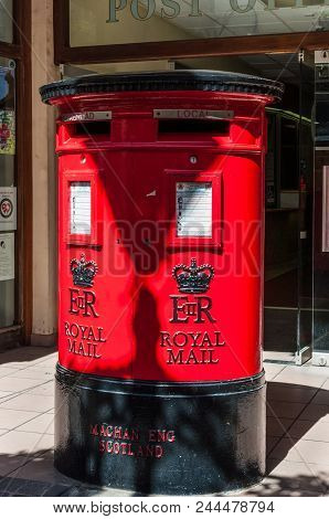 Gibraltar, Uk - May 18, 2017: Red British Style Post Boxes Outside The Post Office In Gibraltar,  Un