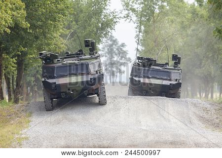 German Light Armoured  Reconnaissance Vehicle Drives On A Road