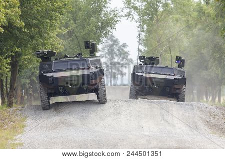 German Light Armoured  Reconnaissance Vehicle Drives On A Road