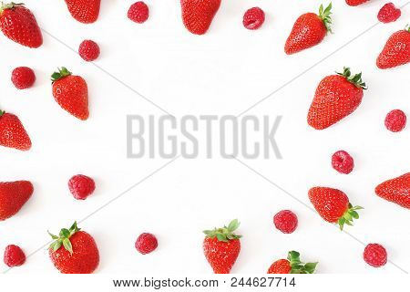 Summer Fruit Pattern. Healthy Fresh Red Strawberries And Raspberries, Isolated On White Table Backgr