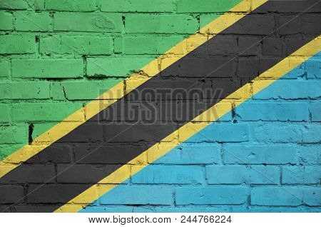 Tanzania Flag Is Painted Onto An Old Brick Wall