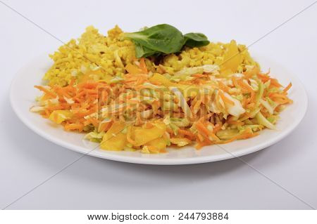 Baked Bulgar With Cauliflower And Vegetable Salad On A White