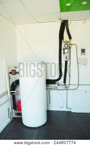 Boiler Room With Solar Water Heater Tank For House Energy Efficiency.  Modern Gas Boiler, Heating El