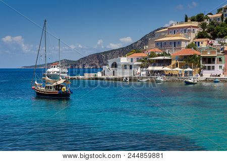 Assos, Kefalonia, Greece - May 25, 2015: Amazing Seascape Of Beach Of Assos Village And Beautiful Se