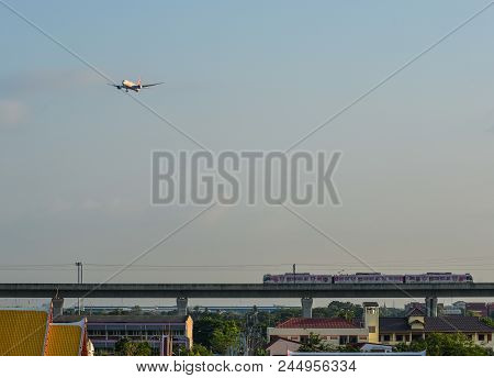 Bangkok, Thailand - Apr 21, 2018. Various Transportation (electric Sky Train And Airplane) Near Lat 