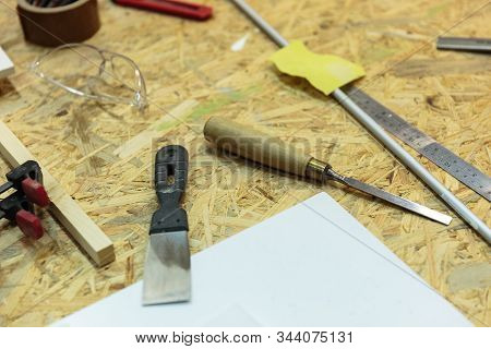 Set Of Carpenters Tool On Tne Wood And Shavings