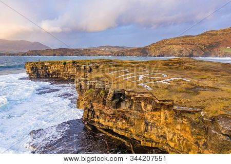 Aerial View Of Huge Waves Breaking At Muckross Head - A Small Peninsula West Of Killybegs, County Do