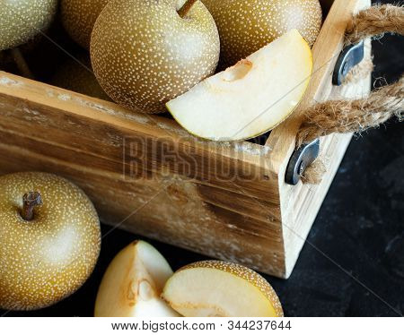 Nashi Pears (apple Pears Or Asian Pears) On A Wooden Table