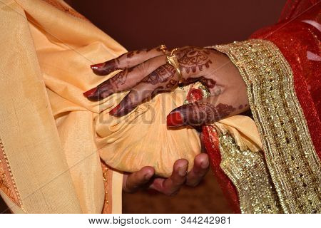 Close Up Of Asian Couple's Hands At A Wedding, Concept Of Marriage, Partnership, Commitment