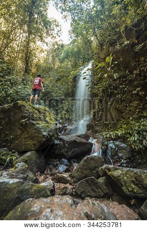 Yojoa Lake, Honduras »; December 2019: A Young Man In The Waterfall Of The Cerro Azul Meambar Nation