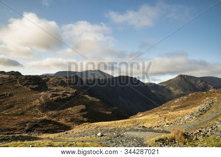 Beautiful Autumn Fall Landscape Image Of Haystacks And High Stile Mountain Peaks In Lake District Wi