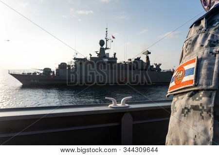 Chonburi, Thailand - December 24, 2019 : Notable Royal Thai Navy Ensign Flag Fabric Badge Over The G