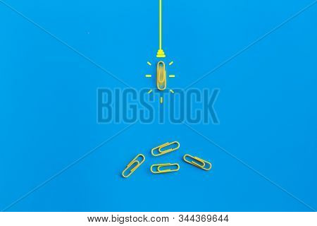 Great Ideas Concept With Paperclip,thinking,creativity,light Bulb On Blue Background,new Ideas Conce