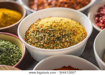 Vegeta And Variety Spices And Herbs In Bowls. Dry Vegetable With Salt And Herbs.