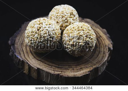 Tilgul Or Sweet Sesame Laddu For Indian Festival Makar Sankranti, Sesame Seed Ball And Tilgul. Speci
