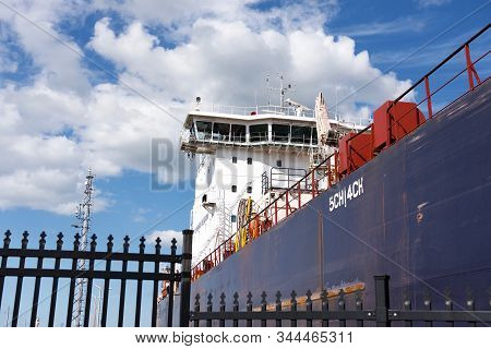 Welland Canal, Lock 7, St. Catherines, Ontario, August 25, 2019: Looking Up At Wheellhouse Of Freigh