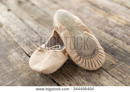 Ballet Shoes  Laying On Rough Vintage Wood, With Natural Light, Ballet Shoes For Kids