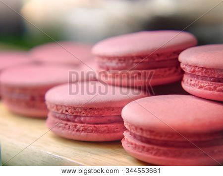 Selective Focus Of French Strawberry Macaroons, Sweet Pink Almond Macarons Or French Sweet Cookie.