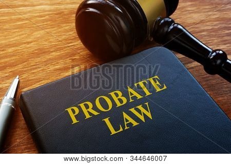 Probate Law Book And Wooden Gavel In The Court.
