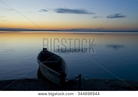 Sunrise... Boat On Lake