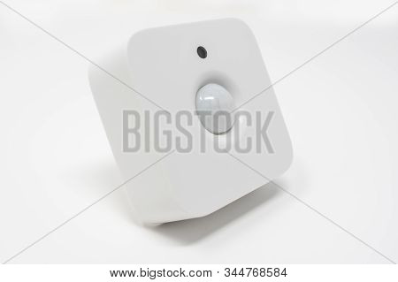 Modern Motion And Light Sensor. For Security Or Home Automation Purposes. Isolated On A White Backgr