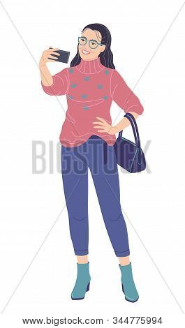 Young Woman With Glasses Taking Selfie Photo On Smartphone. Bespectacled Girl In Trendy Clothes Hold