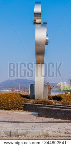 Tall Metal Sculpture In Public