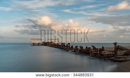 Dilapidated Old Fishing Dock Collapsing Into The Sea In Pak Nam Pran On The Gulf Of Thailand In Thai