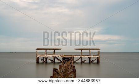 Dilapidated Old Fishing Dock Collapsing Into The Sea In Pak Nam Pran On The Gulf Of Thailand In Thai