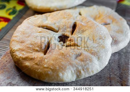 Lobiani, Traditional Georgian Flatbread With Red Beans Stuffing, Close-up With Selective Focus. Lobi