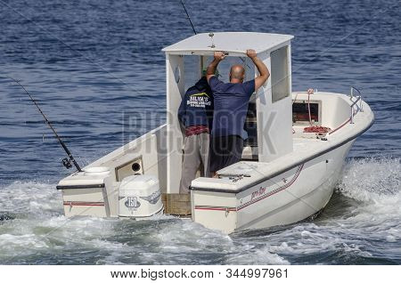 Fairhaven, Massachusetts, Usa - August 4, 2019: Recreational Fishermen In Center Console Boat Inboun