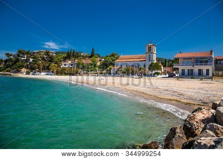 Evia, Greece-May 31, 2018: Beautiful panoramic view on Asmini beach and church,  Evia island.  Greece. Europa.