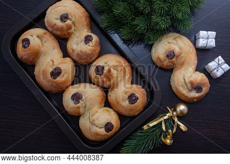 Swedish And Scandinavian Saffron Buns Lussekatter On A Table
