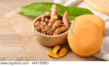 Turmeric Soap And Fresh Turmeric Root In A Bowl, Herbal Organic Soap For Skin Care