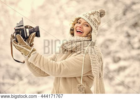 Spend Day Outdoors. Girl With Vintage Camera In Snowy Nature. Holidays Concept. Capturing Winter. Ta