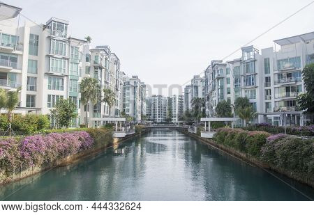Singapore Dec 29 2021: View Of Keppel Bay With Modern Residence In Singapore City. Keppel Bay Is The
