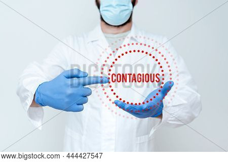 Text Sign Showing Contagious. Business Approach Transmissible By Direct Or Indirect Contact With Inf