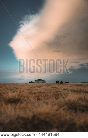 Cosy Log Cabin Retreat In Snow Covered Landscape, Iceland, Europe. Iceland Nature With Typical Yello