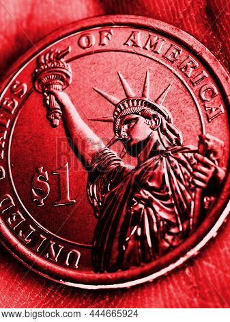 American Coin Lies In The Palm. 1 Dollar Close-up. Red Vertical Tinted Illustration In Republican Pa