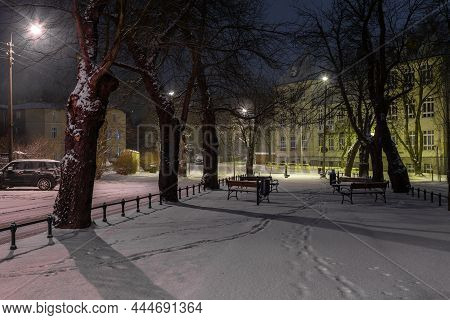 Poland, Gdansk, Oliwa - 23 February 2018: View Of The Illuminated, Snow-covered Old Town In Oliwa. W