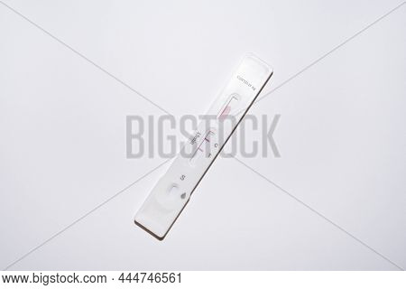 Positive At-home Covid Self-test On White Background. Over-the-counter Otc Tests For Corona Pandemic