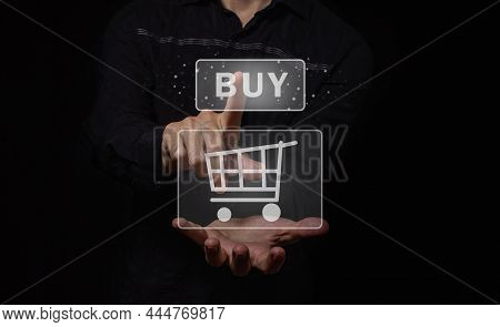Digital Shopping Cart Carrying Out Online Shopping. The Modern Way Of Shopping Without Leaving Your 