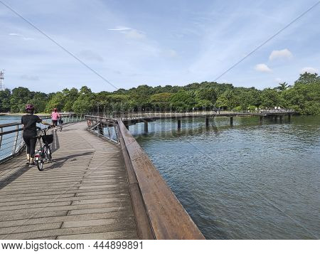 Singapore Dec 29 2021: View Of Bukit Chermin Boardwalk In Singapore. It Is Built On The Sea Along Th