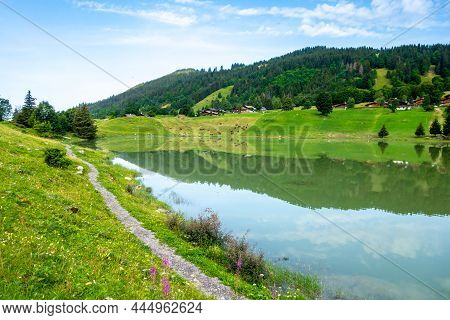 Lake Of The Confins And Mountain Landscape In La Clusaz, Haute-savoie, France