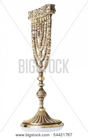 Candlestick with nine arms and white candles( chanukkiah / hanukiah for chanuka / hannukah - ????? ). isolated on white.