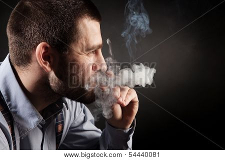 guy in a business style with a cigar