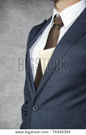 Envelope Sticking Out From Behind The Suit