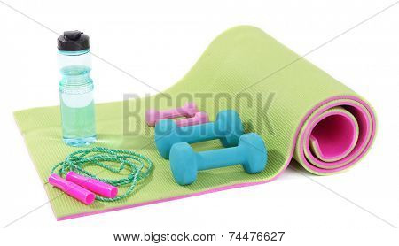 Sports requisites on sport mat isolated on white