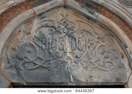 Floral Decor On The Entrance To The Church In Geghard