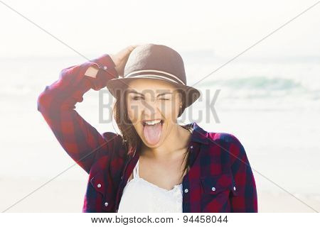 Portrtait of a happy girl enjoying the day on the beach